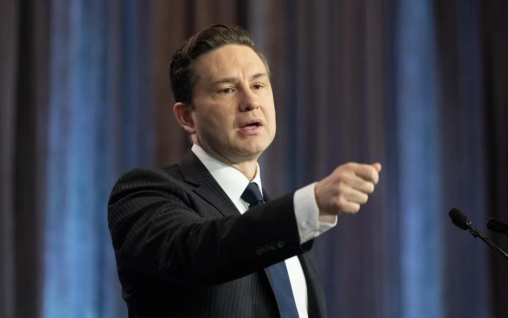 Pierre Poilievre pointing his hand and talking