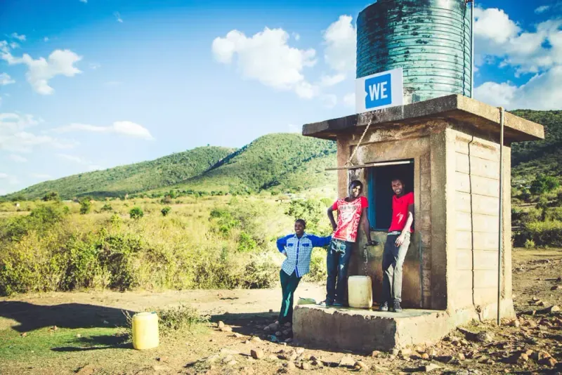 water tank on a building with people out front